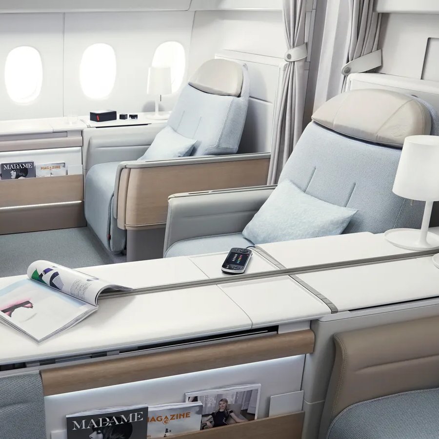 como volar en primera clase barato