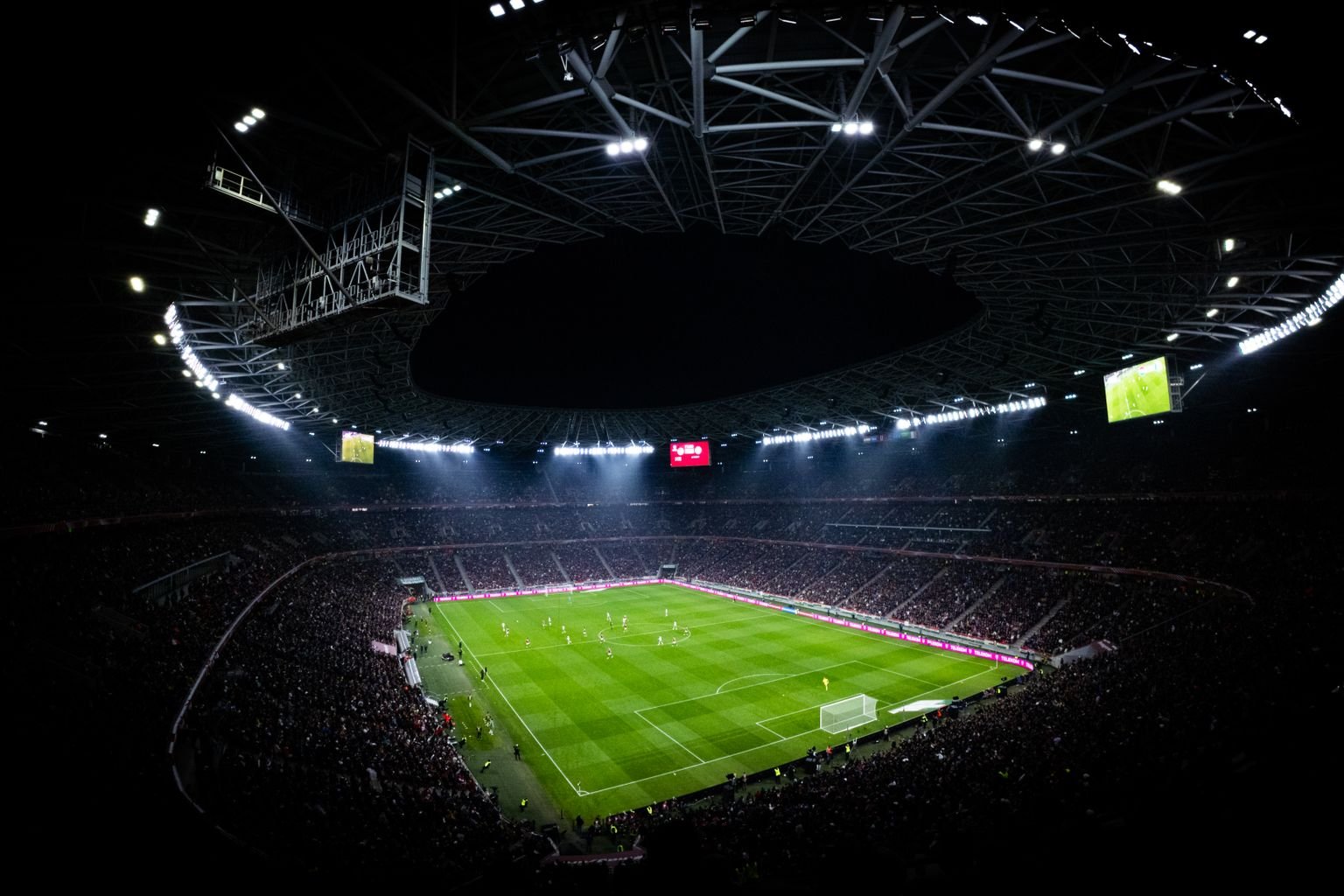 boletos mundial qatar - estadio de futbol lleno de noche